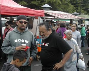 Maori Party co-leader Pita Sharples (centre) meets supporters at the Otara flea market in...