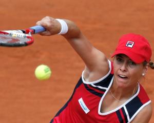 Marina Erakovic serves to Petra Kvitova. REUTERS/Gonzalo Fuentes