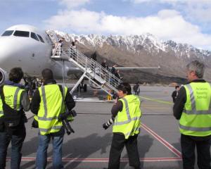 Media wait at Queenstown Airport for the Ireland Rugby World Cup squad to disembark from their...