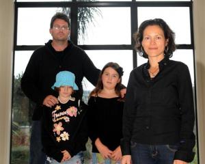 Michael Beazley  with (left to right) daughters Portia (9) and Alyssa (10) Beazley and wife...