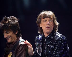 Mick Jagger (R) and Ronnie Wood of The Rolling Stones perform at the Barclays Center in New York...