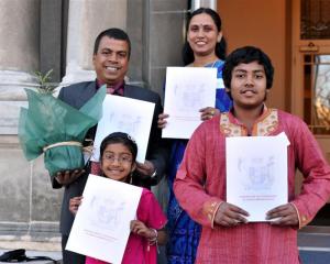 Newly sworn New Zealand citizens Abdul Mannan and Momtaj Begum, with their children, Mridula...