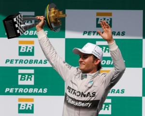 Nico Rosberg celebrates his win in the Brazilian Grand Prix in Sao Paulo. REUTERS/Paulo Whitaker