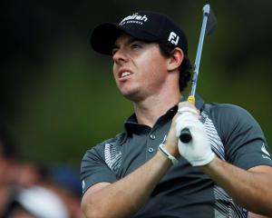 Northern Ireland's Rory McIlroy tees off at the third hole during the second round of the...