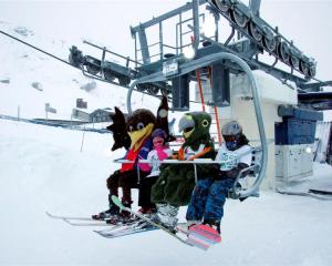 NZSki mascots Spike and Shred share the first chair on Alta lift for the 2013 season with...