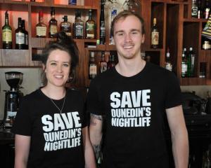 Octagon bar Ratbags staff Laura Dowling (22) and Jared Hewitt (20) wear ''Save Dunedin's...