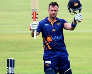 Otago batsman Neil Broom celebrates his century during his side’s Ford Trophy preliminary...