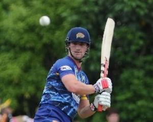 Otago batsman Neil Broom cracks a shot into the off-side during the final of the HRV Cup against...