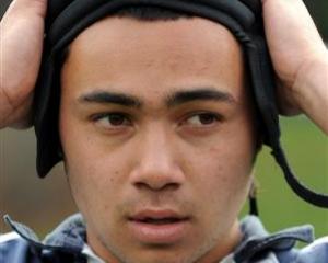 Otago Boys' High School First XV winger Paul-Eti Slater (18) puts Tactic through its paces at the...