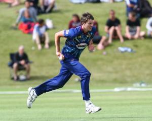 Otago seamer Jacob Duffy runs in to bowl during the Twenty20 match between Otago and Auckland in...