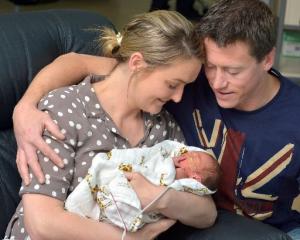 Parents Nicola and Brent Prue dote over new son Angus. PHOTO: GERARD O'BRIEN