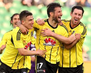 Phoenix players celebrate a goal against Perth at the weekend. Photo Getty