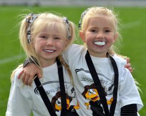 Pirates Rippa rugby players Jemima (6, left) and Lydia Hortop-Blair (4) abuzz after speaking to...