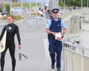 Police close St Clair beach this morning. Photo by Craig Baxter