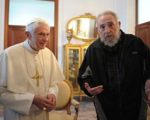 Pope Benedict XVI meets former Cuban leader Fidel Castro in Havana. REUTERS/Osservatore Romano
