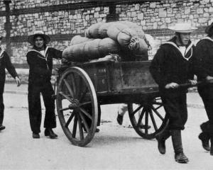 Preparing for the assembly of the British fleet off Portsmouth: Jack Tars conveying kits to the...