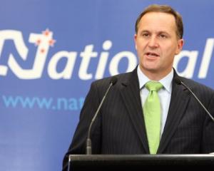 Prime Minister elect John Key at his first press conference following the election. Photo by NZPA