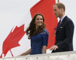 Prince William and Kate, the Duke and Duchess of Cambridge, leave the HMCS Montreal as they...