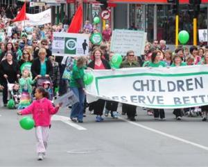 Protesters against cuts to early childhood education march in Dunedin on Saturday. Photo by Craig...