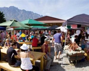 Punters enjoy a summer's day during the Remarkables Market's successful second season. The market...