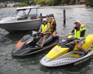 Queenstown Lakes harbourmaster Marty Black (left) with Jessica Forrest (16), of Invercargill and...