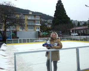 Queenstown Winter Festival manager Lisa Buckingham stands in front of the temporary ice  rink ...