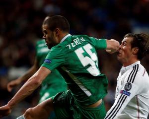 Real Madrid's Gareth Bale gets an elbow in the face from Ludogorets' Georgi Terziev. REUTERS...