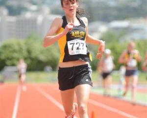 Rebekah Greene (St Hildas) on her way to winning  the women's 3000m at the Caledonian Ground on...