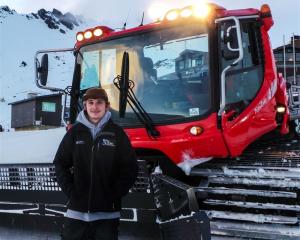 Remarkables groomer Collin Schwartz (24). Photo by Ben Kien.