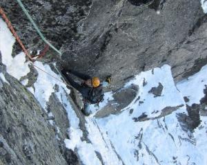 Remarkables Ice and Mixed Festival co-ordinator Daniel Joll, of Queenstown, climbs the first...