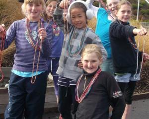 Remarkables Primary School pupils with some of the beads that will be for sale during the ...