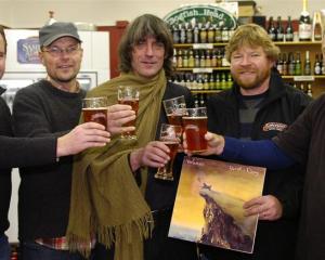 Sampling Bird Dog Pale Ale yesterday are (from left) Castle Macadam owners Alastair McDonald and...