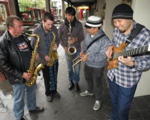 Saxophonist Dr Jason Thornton (left), of Queenstown, jams with (from left) saxophonist Jimmy...
