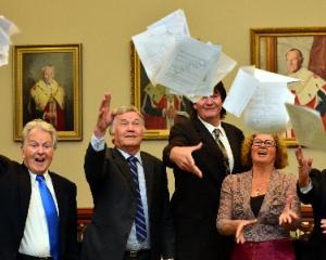 Saying farewell to Dunedin City Council papers yesterday are retiring councillors (from left)...