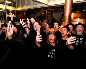 Serenading at Speight's Brewery in Dunedin yesterday are Spooky Men's Chorale members, some...