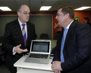 Southern DHB medical director of IT Dr Andrew Bowers (right) shows Health Minister Tony Ryall a...