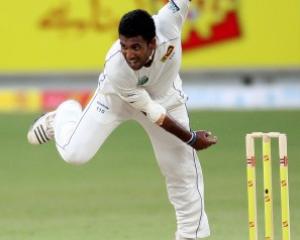 Sri Lanka's Dammika Prasad bowls during the first day of the second test against Pakistan in...