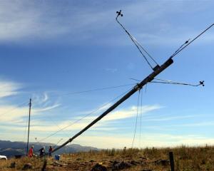 Staff from wind energy consultancy Energy 3 and Pioneer Generation install a 30m wind testing...