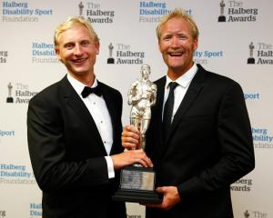 Supreme Halberg Award winners Hamish Bond (L) and Eric Murray pose with the trophy at the awards...