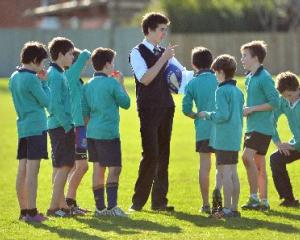 Taieri College pupil  and East Taieri Primary School rugby team coach Christian Henderson (16)...