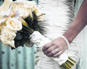 The bridal bouquet at the wedding of Casey Whitaker and Kong-Ja Scorgie, who were married at...