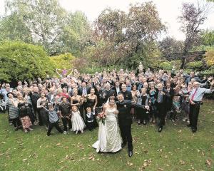 The celebratory gathering of guests at the wedding of Sarah Davie and Petros Nitis at the
...