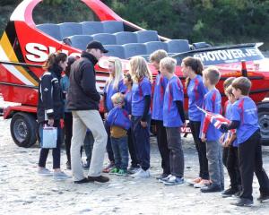 The Duke and Duchess of Cambridge chat to Arrowtown Primary School children on Shotover Beach...