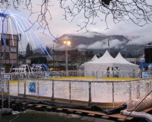 The Queenstown Winter Festival's temporary outdoor ice rink, constructed on the Village Green in...