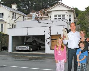 The Stedmans (clockwise from back left) Conrad, Bridget, Samuel (7) and Meg (11) have a 1920s...