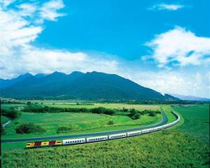 The Sunlander makes its way through the Queensland countryside. Photo by Travel Train.