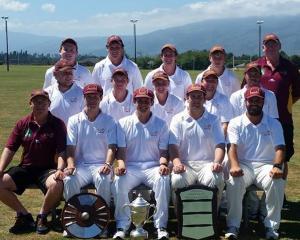 The victorious North Otago team with the spoils following its Hawke Cup win against Buller...
