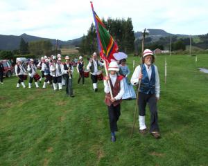 The Waitati Militia is pictured leading  a march past. Photo by Bill Campbell.