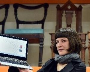 Toitu Otago Settlers Museum collections manager Kiri Griffin displays the digital archive in...