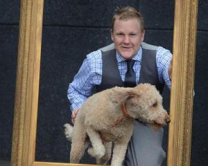 Toitu Otago Settlers Museum exhibition developer William McKee, with his dog Louis (2), is...